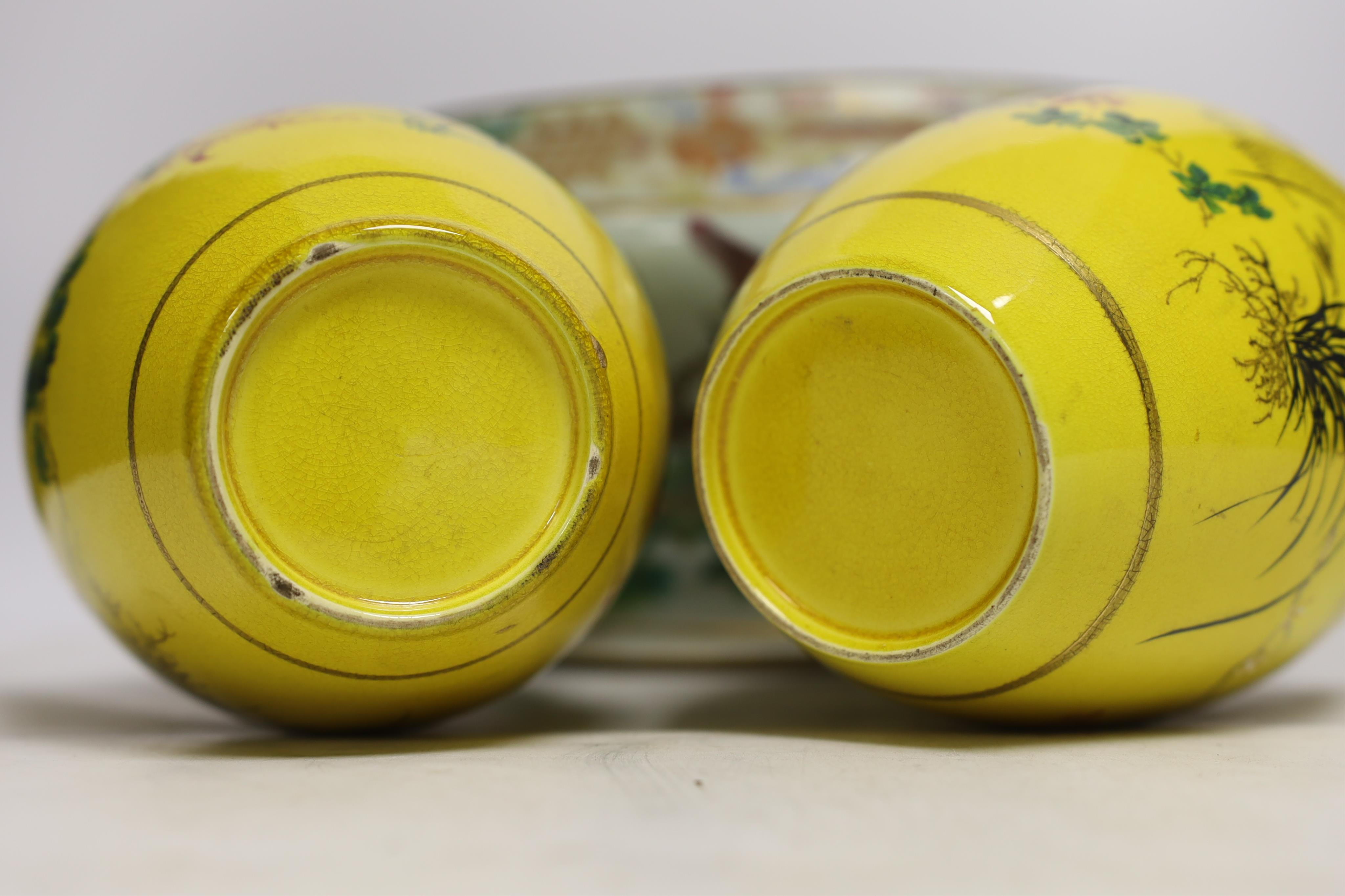 A 19th century Chinese famille rose tureen (lacking cover), a bronze mirror, a brush pot, a crackle glazed teabowl and a pair of Japanese yellow glazed satsuma jars and covers, tallest 18cm (6)